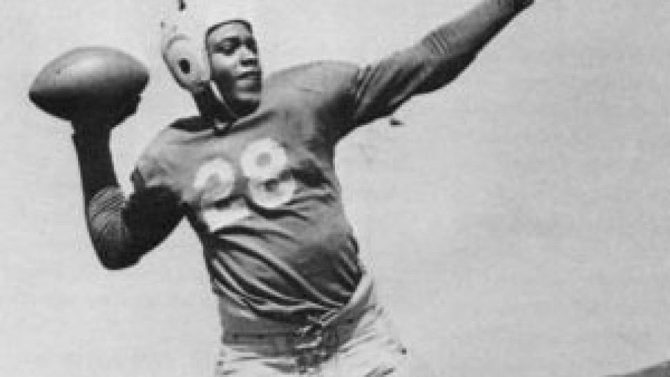 black and white photograph of a quarterback