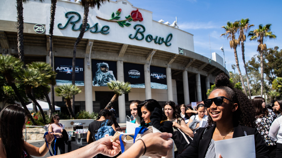 Group of women in front of the Rose Bowl Stadium